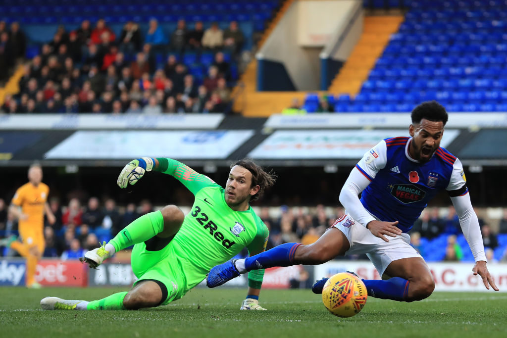3rd November 2018, Portman Road, Ipswich, England; EFL Championship football, Ipswich Town versus Preston North End; Chris Maxwell of Preston North End fouls Jordan Roberts of Ipswich Town and gives away a penalty (photo by Shaun Brooks/Action Plus via Getty Images)