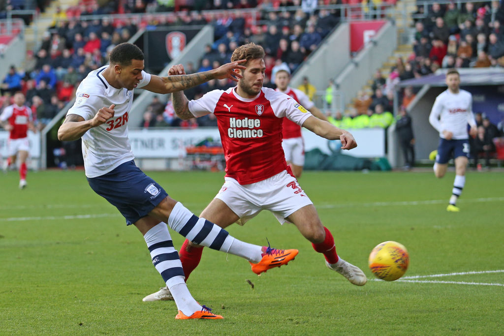 ROTHERHAM, ENGLAND - JANUARY 01:  Preston North End's Lukas Nmecha squeezes a shot past Rotherham United's Joe Mattock during the Sky Bet Championship match between Rotherham United and Preston North End at The New York Stadium on January 1, 2019 in Rotherham, England. (Photo by David Shipman - CameraSport via Getty Images)